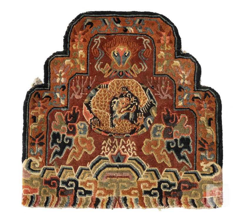 A Throne carpet and two rugs